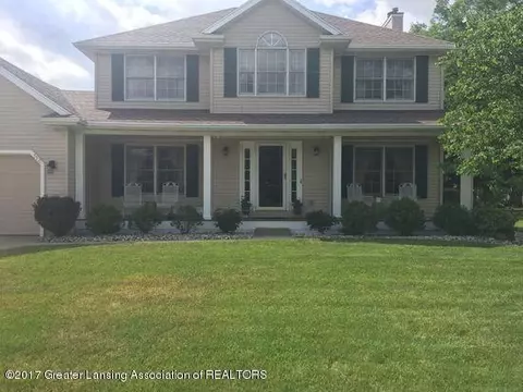 310 Windyrush Ln, Dewitt, MI 48820 photo 1