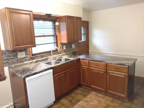1730 Nottingham Rd, Lansing, MI 48911 photo 3