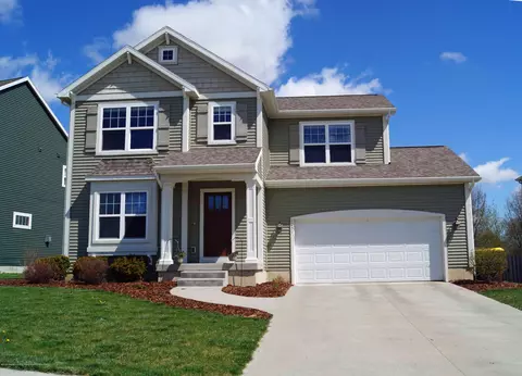 1051 Oakwood Dr, Dewitt, MI 48820 photo 1