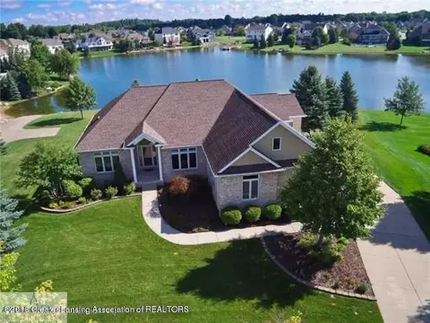 12825 Paradise Dr, Dewitt, MI 48820 photo 1