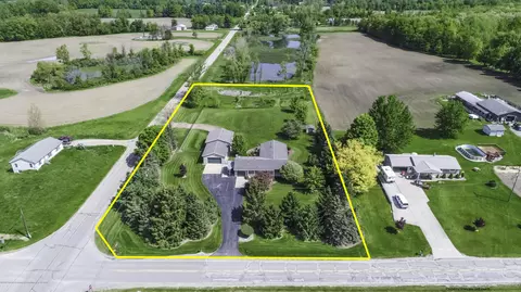8990 W Howe Rd, Eagle, MI 48822 photo 2