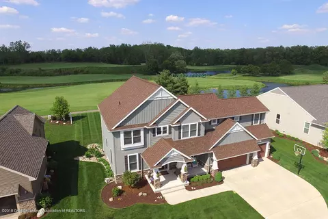 4855 E Hawk Hollow Dr, Bath, MI 48808 photo 1