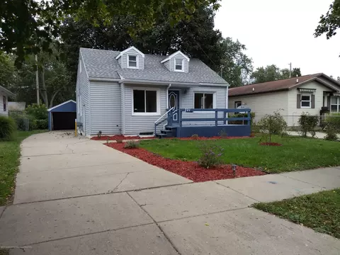 721 E Cavanaugh Rd, Lansing, MI 48910 photo 1