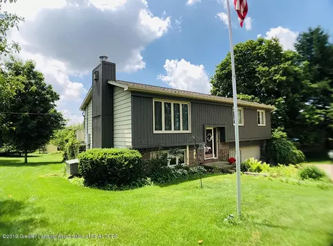 7075 W Herbison Rd, Dewitt, MI 48820 photo 1