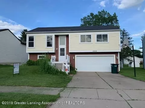 5809 Laporte Dr, Lansing, MI 48911 photo 1