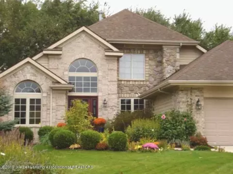 7979 Ashbrook Dr, Haslett, MI 48840 photo 1