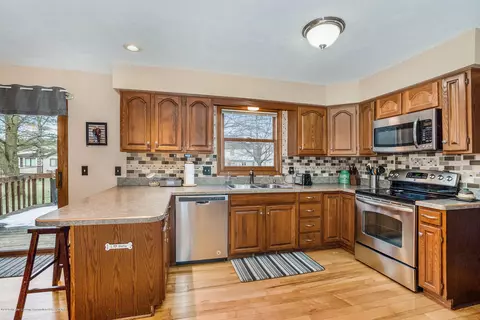5897 Buttonwood Dr, Haslett, MI 48840 photo 14
