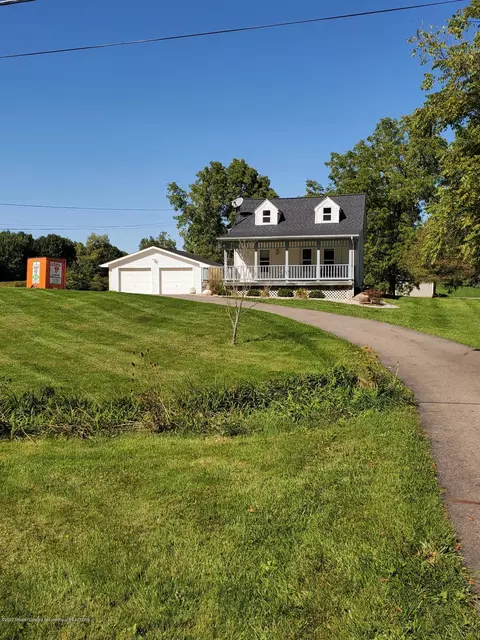 8480 W Howe Rd, Eagle, MI 48822 photo 1