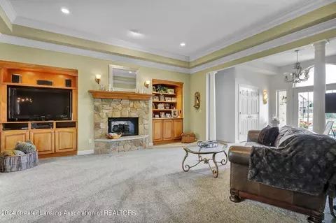 Living - 406 W Spring Meadows Ln, Dewitt, MI 48820 photo 2 of 2
