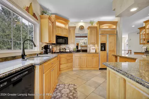 Kitchen - 406 W Spring Meadows Ln, Dewitt, MI 48820 photo 7 of 9