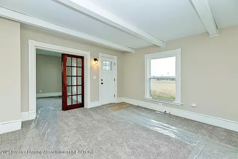 Living - 10105 W Howe Rd, Eagle, MI 48822 photo 1 of 1
