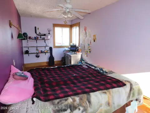 Bedroom - 377 E Dexter Trl, Mason, MI 48854 photo 8 of 9