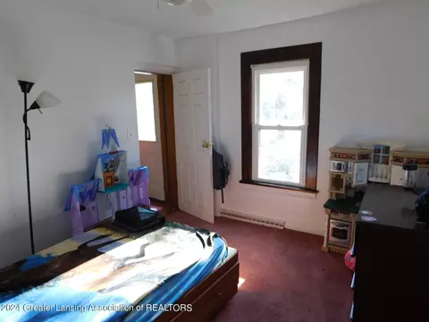 Bedroom - 377 E Dexter Trl, Mason, MI 48854 photo 2 of 9