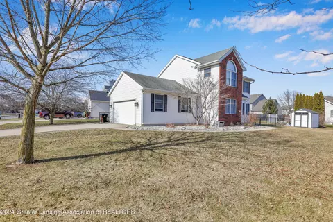 Exterior - 1016 Durango Dr, Lansing, MI 48917 photo 4 of 11