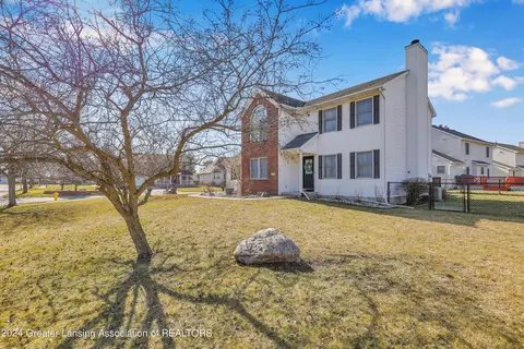 Exterior - 1016 Durango Dr, Lansing, MI 48917 photo 6 of 11