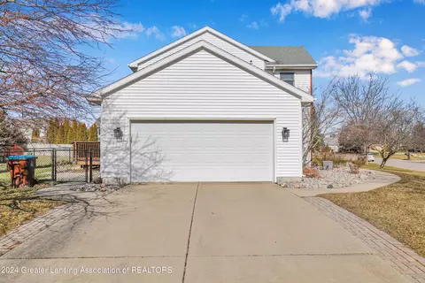 Exterior - 1016 Durango Dr, Lansing, MI 48917 photo 3 of 11