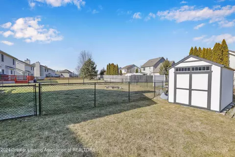 Exterior - 1016 Durango Dr, Lansing, MI 48917 photo 10 of 11