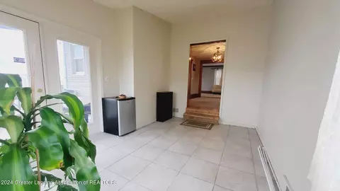Living - 317 Ferguson St, Lansing, MI 48912 photo 2 of 2