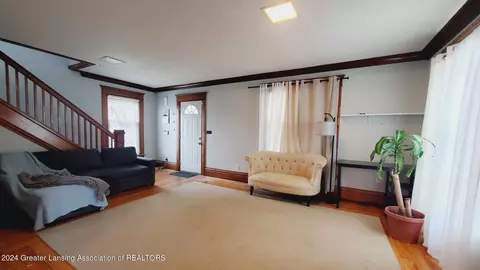 Living - 317 Ferguson St, Lansing, MI 48912 photo 1 of 2
