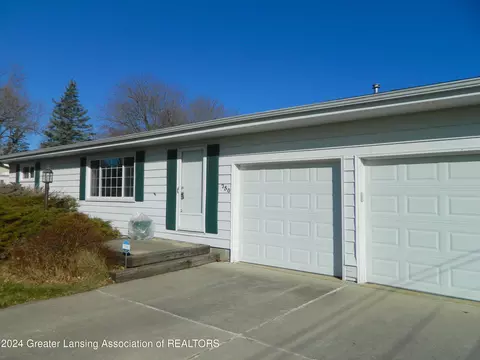 Exterior - 750 Raymond Rd, Owosso, MI 48867 photo 2 of 11