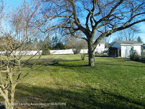 Exterior - 750 Raymond Rd, Owosso, MI 48867 photo 6 of 11