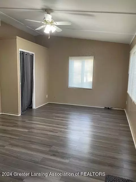 Living - 2809 Fielding Dr, Lansing, MI 48911 photo 2 of 3