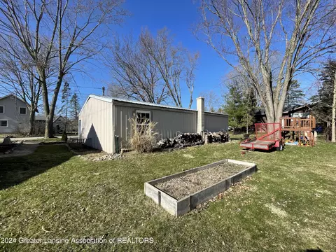 Exterior - 207 E Washington St, Dimondale, MI 48821 photo 5 of 17