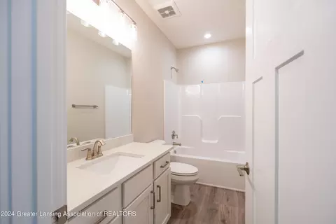 Bath - 6215 Hilltop Ct, Bath, MI 48808 photo 1 of 3