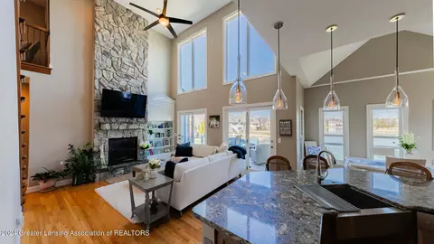 Living - 12955 Paradise Dr, Dewitt, MI 48820 photo 1 of 7
