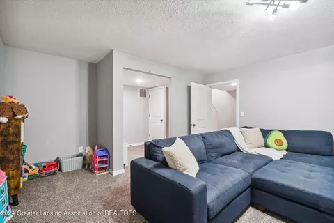 Living - 12940 Serenity Pl, Dewitt, MI 48820 photo 3 of 3
