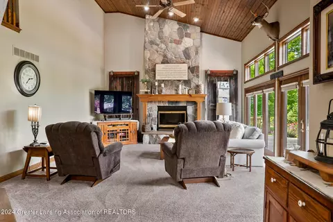 Living - 11108 Eden Trl, Eagle, MI 48822 photo 5 of 15