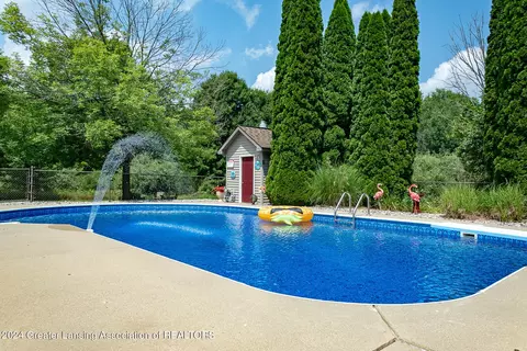 Exterior - 11108 Eden Trl, Eagle, MI 48822 photo 5 of 14