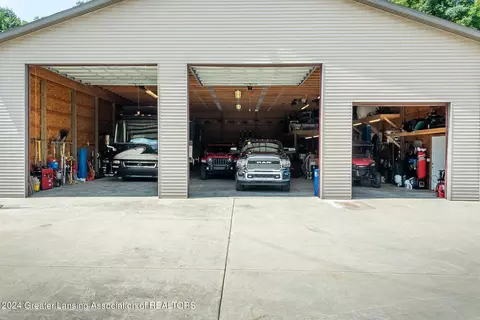 Exterior - 11108 Eden Trl, Eagle, MI 48822 photo 11 of 14