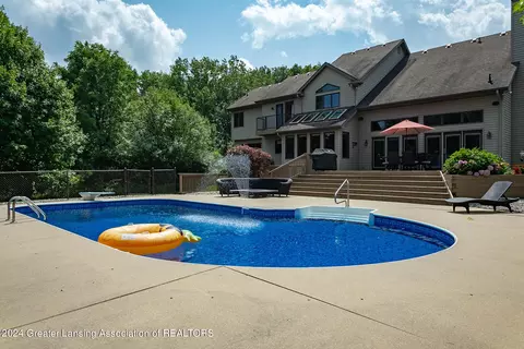 Exterior - 11108 Eden Trl, Eagle, MI 48822 photo 6 of 14