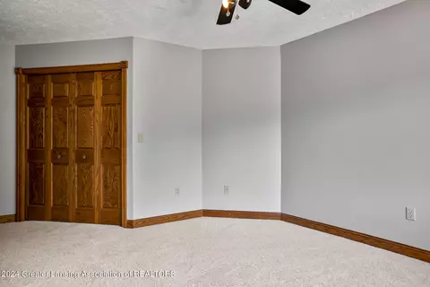 Bedroom - 11108 Eden Trl, Eagle, MI 48822 photo 11 of 13