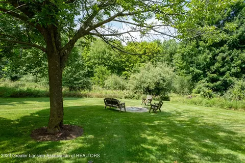 Exterior - 11108 Eden Trl, Eagle, MI 48822 photo 7 of 14