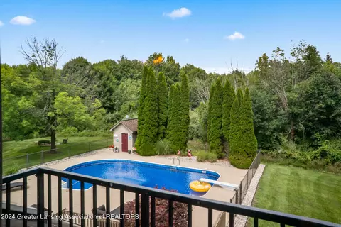 Exterior - 11108 Eden Trl, Eagle, MI 48822 photo 4 of 14