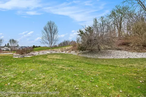 Exterior - 4640 Hawk Hollow Dr, Bath, MI 48808 photo 9 of 13