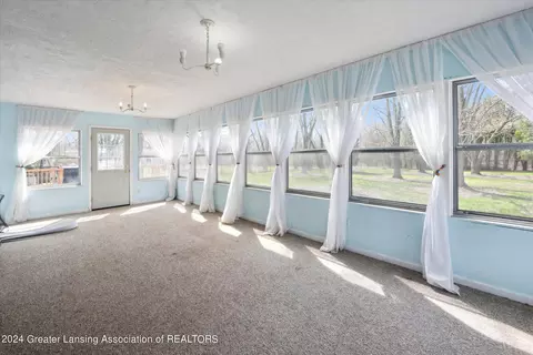 Living - 2385 Pine Tree Rd, Holt, MI 48842 photo 2 of 2