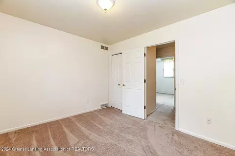 Bedroom - 5740 Forest Green Dr, Perry, MI 48872 photo 4 of 7