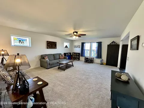Living - 6482 Firefly Dr, Holt, MI 48842 photo 1 of 6
