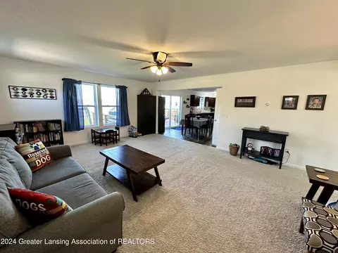 Living - 6482 Firefly Dr, Holt, MI 48842 photo 2 of 6