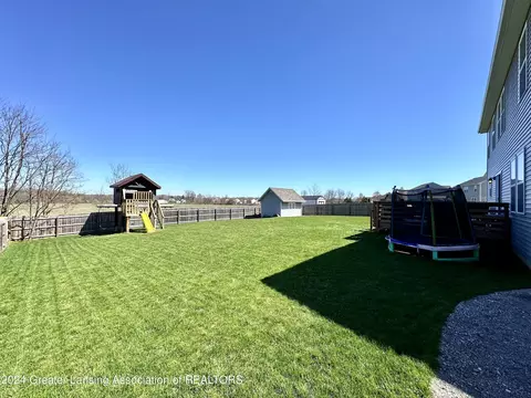 Exterior - 6482 Firefly Dr, Holt, MI 48842 photo 9 of 12