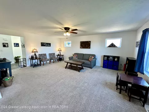 Living - 6482 Firefly Dr, Holt, MI 48842 photo 3 of 6