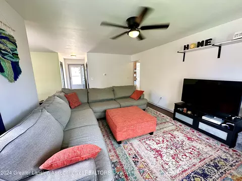 Living - 1218 Redpole Dr, Dewitt, MI 48820 photo 3 of 6