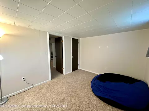 Bedroom - 1218 Redpole Dr, Dewitt, MI 48820 photo 8 of 9