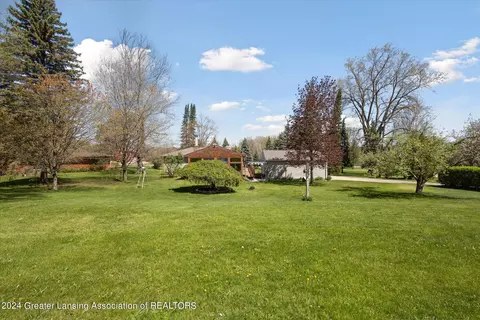 Exterior - 3957 Dell Rd, Holt, MI 48842 photo 6 of 7