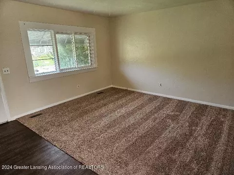 Living - 3728 N Aurelius Rd, Lansing, MI 48910 photo 1 of 2