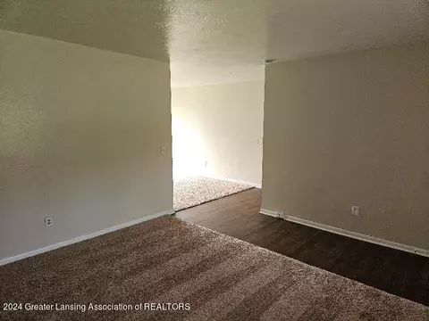 Living - 3728 N Aurelius Rd, Lansing, MI 48910 photo 2 of 2