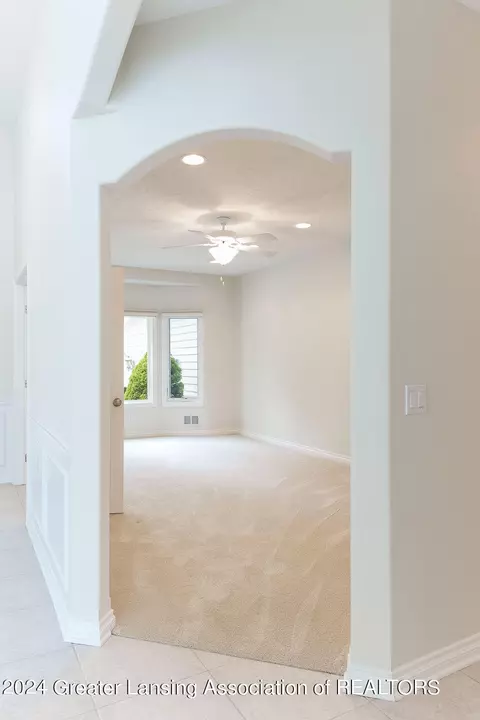 Living - 6031 E Lake Dr, Haslett, MI 48840 photo 4 of 7